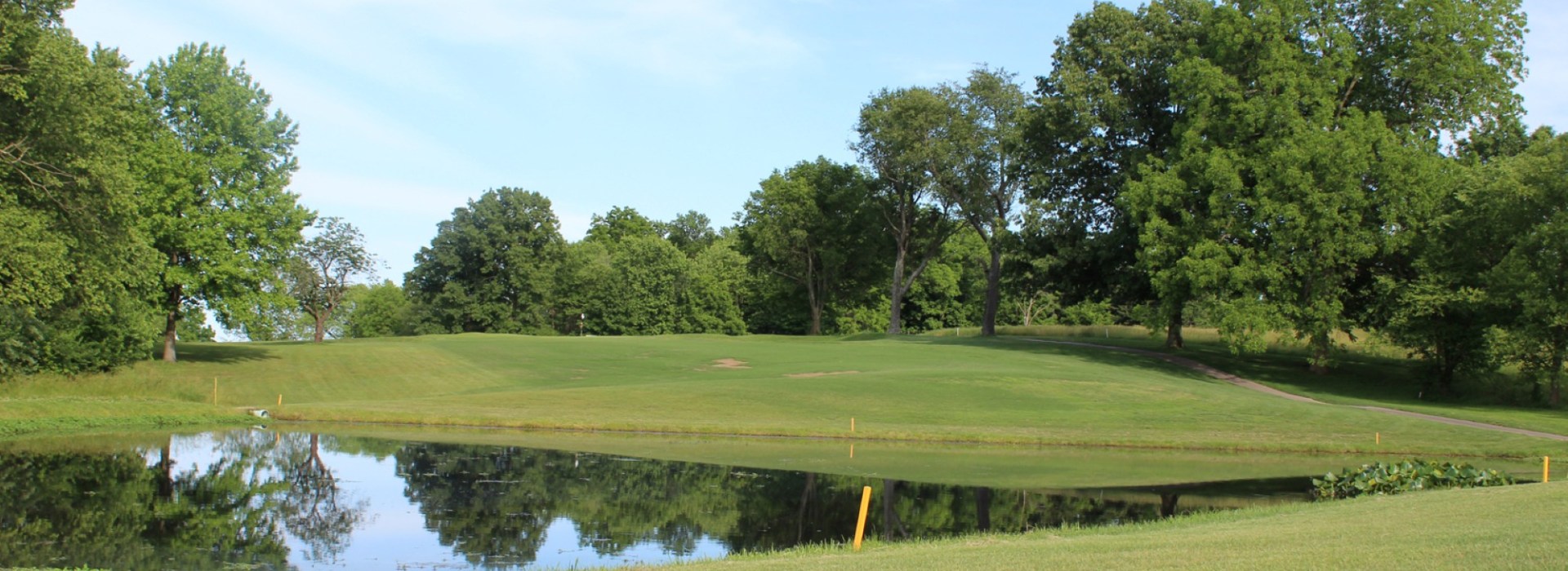 Golf course trees and pond